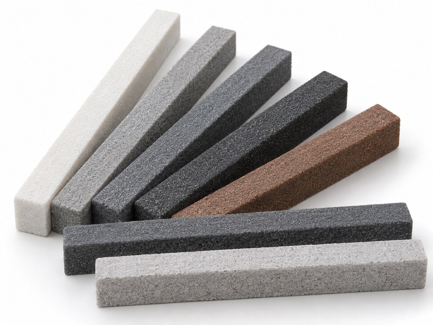 Conventional abrasive dressing sticks in multiple grades