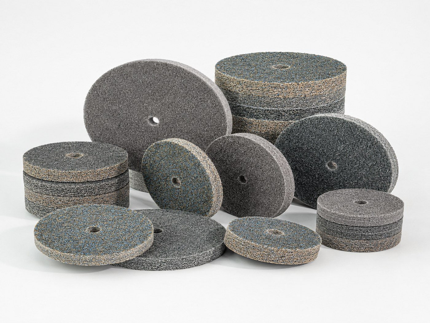 Industrial non-woven unitized wheels in multiple sizes